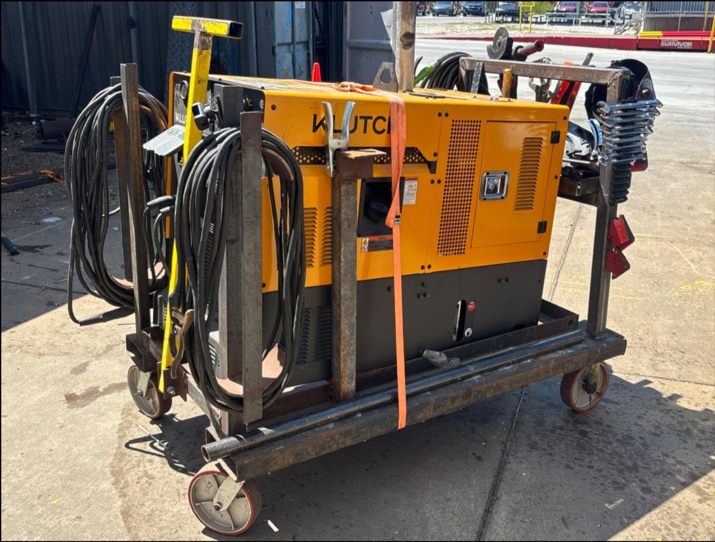 Front of the mobile rig with grinders and clamps racked