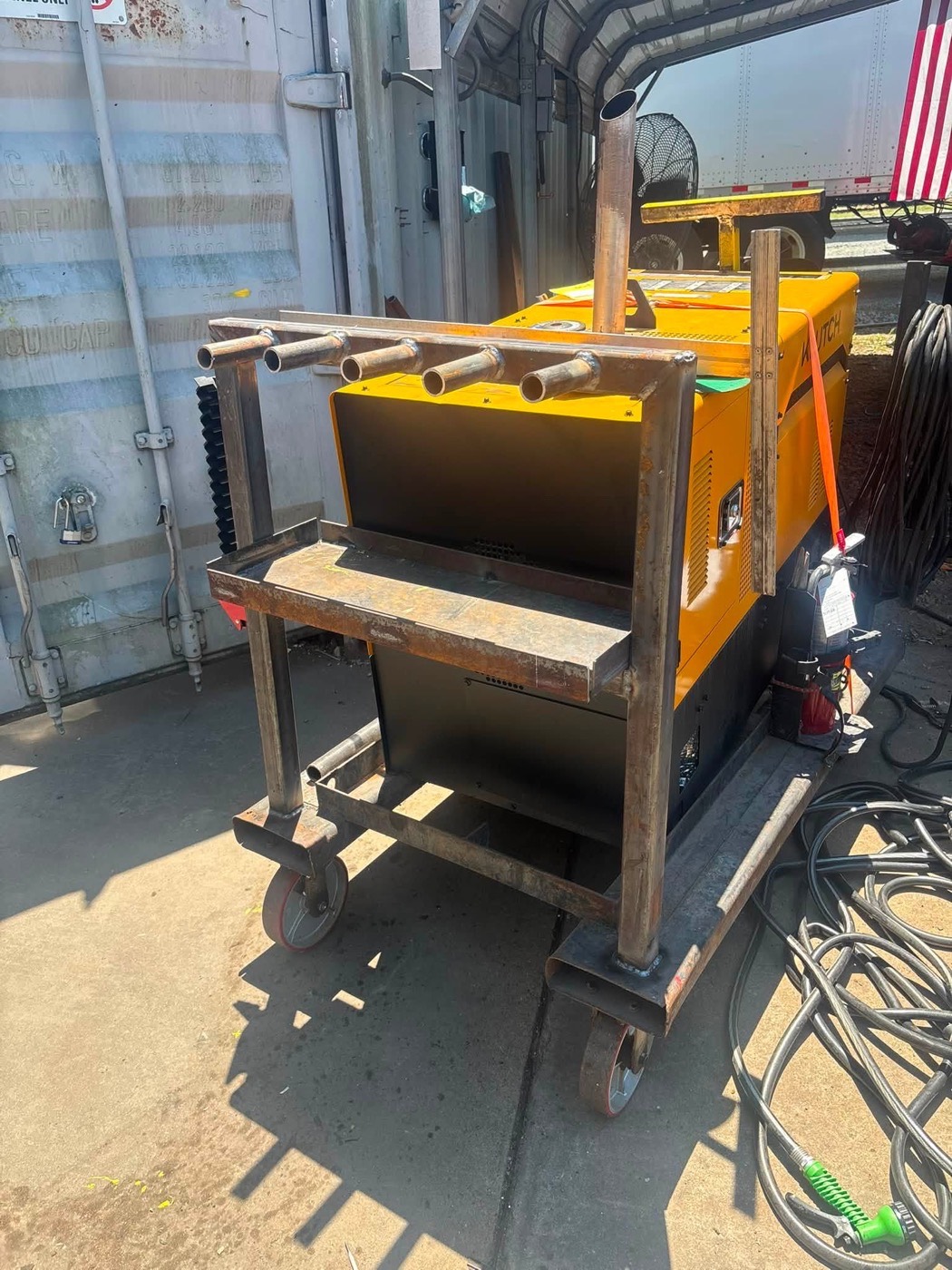 Hand-welded torch rack detail